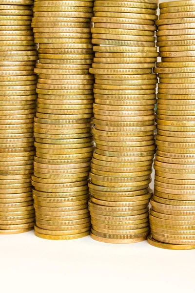 Quattro pile di monete d'oro — Foto Stock