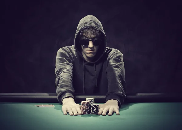 Poker player going all-in — Stock Photo, Image