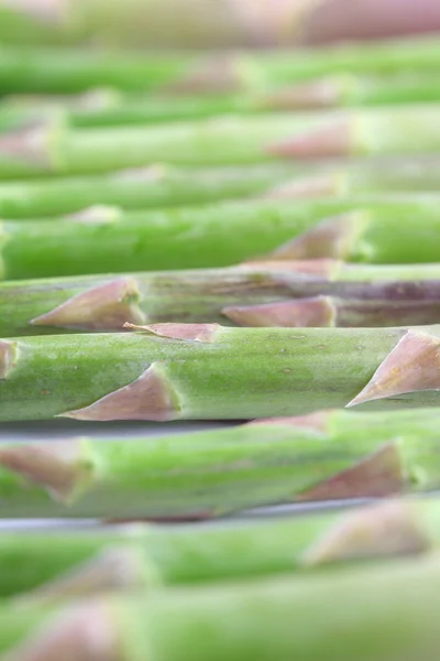 Green asparagus stem background — Stock Photo, Image