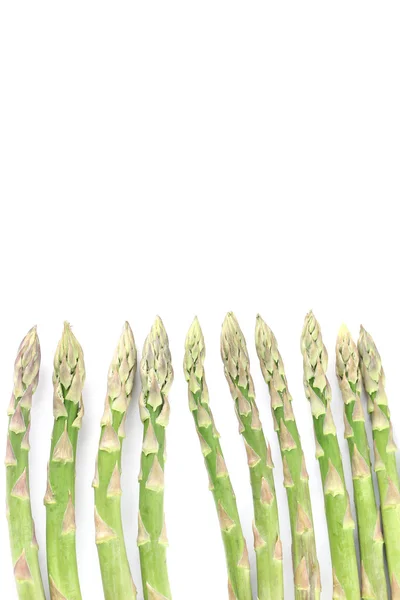 Confine con asparagi verdi — Foto Stock