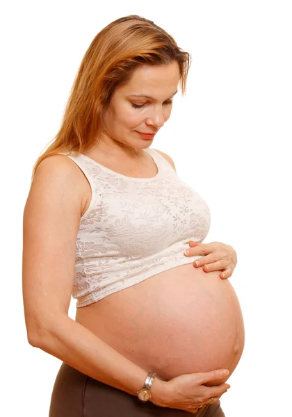 Senior zwangere vrouw. geïsoleerd op wit. — Stockfoto