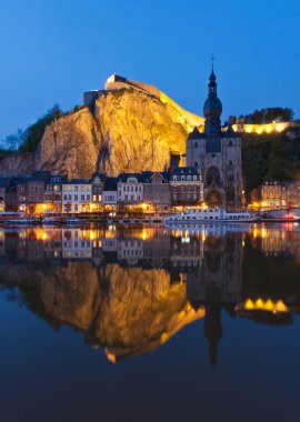Cityscape at night of Dinant, Belgium clipart