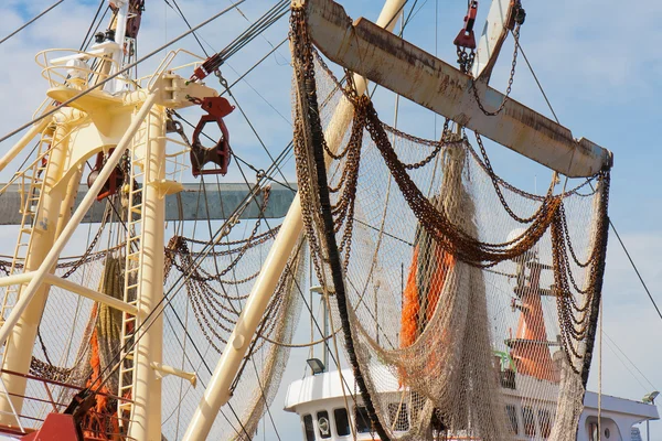 Nets of Dutch fishing cutter hanging out to dry — Stock Photo, Image