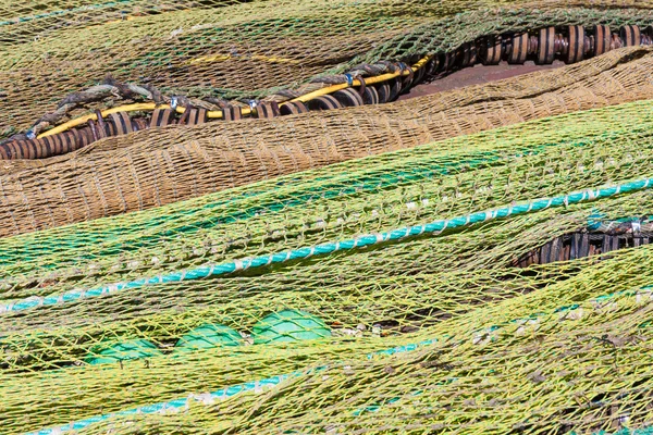 Close-up of fishing net and floats background — Stock Photo, Image