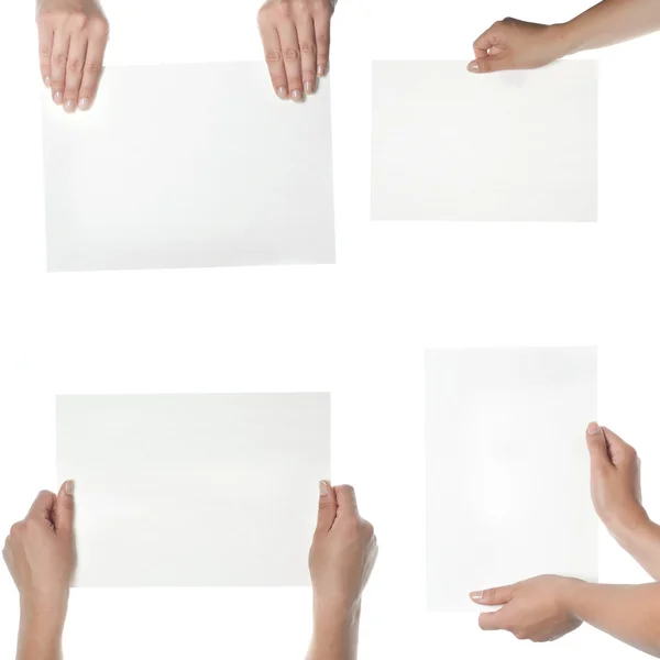 Colección de la mano que sujeta el papel en blanco sobre fondo blanco — Foto de Stock