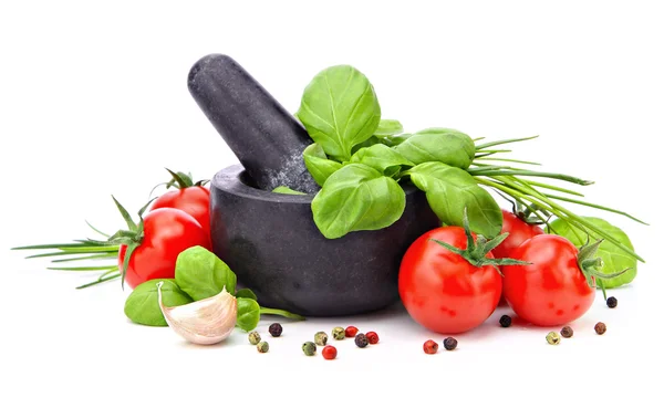 Mortar with basil, garlic, tomatoes and pepper — Stock Photo, Image