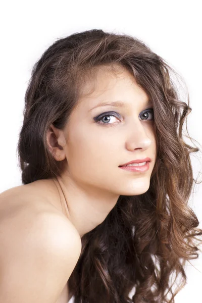 Pretty young woman with curly hair — Stock Photo, Image