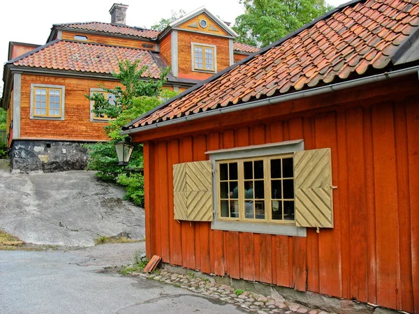 Švédský červená a žlutá kabina — Stock fotografie