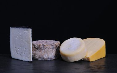 Selection of cheeses. clipart