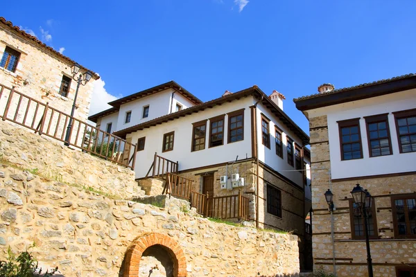 Casa tradicional com vista para Kastoria, Grécia Fotos De Bancos De Imagens