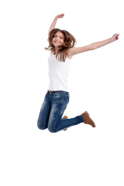 Šťastné dospívající dívka, která skočila, izolované na bílém pozadí — Stock fotografie