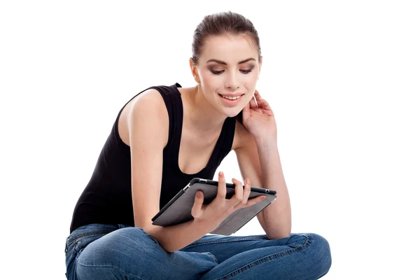Teen flicka med en tablett — Stockfoto