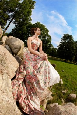 Princess in an vintage dress in nature clipart