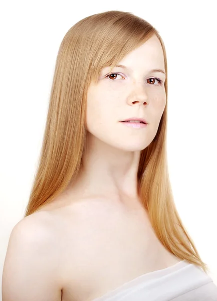 Vacker flicka på en vit bakgrund — Stockfoto
