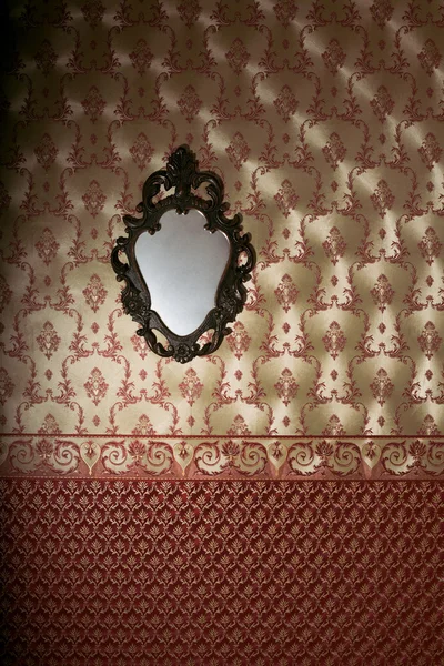 Vintage mirror on the luxury wall with wallpaper — Stock Photo, Image