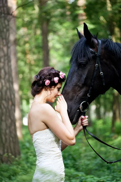 Woman and horse — Stock Photo, Image