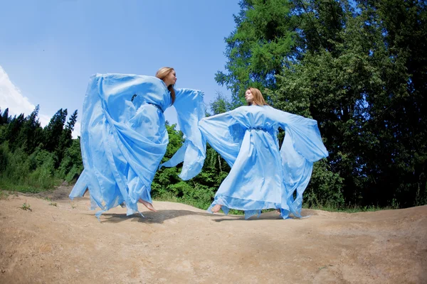 Two woman, twins in the forest — Stock Photo, Image