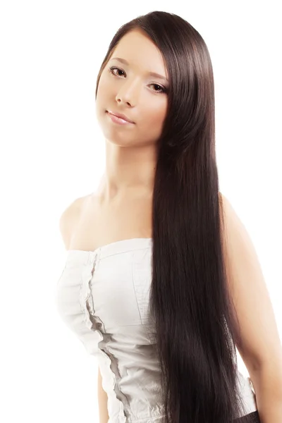 Menina com um cabelo luxuoso, brilhante e bonito — Fotografia de Stock