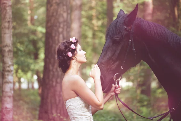Mujer y caballo Imágenes de stock libres de derechos