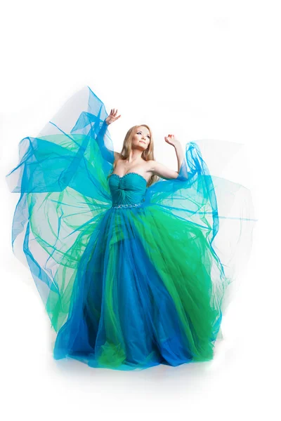 Stijlvolle vrouw in een blauwe jurk — Stockfoto