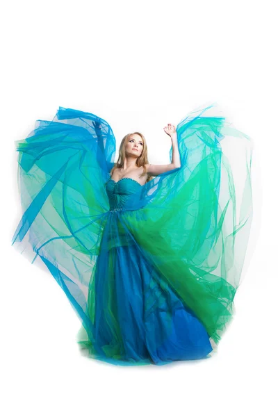 Snygg kvinna i en blå klänning Royaltyfria Stockbilder
