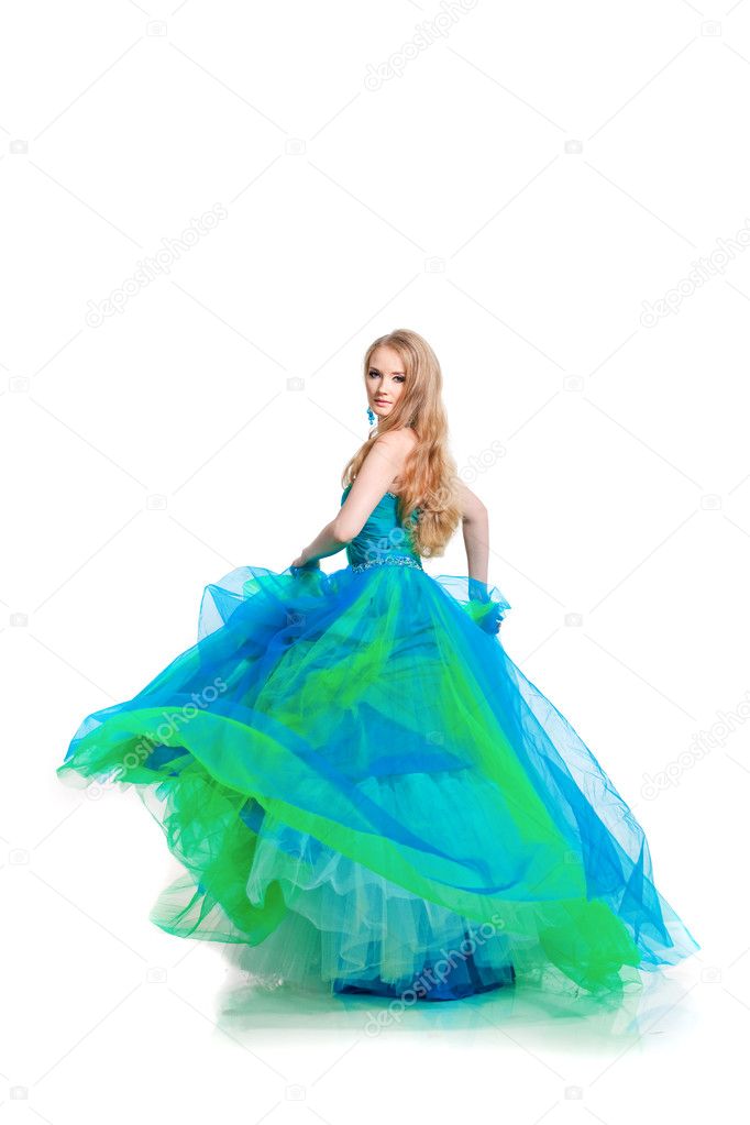 Stylish woman in a blue dress