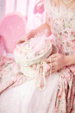 Romantic woman in a vintage dress