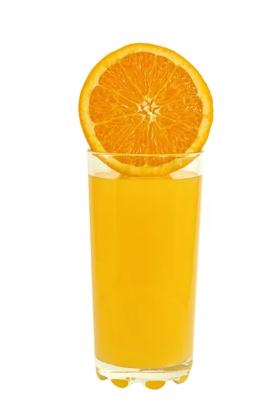 Sklenice pomerančové šťávy a půl pomeranče — Stock fotografie