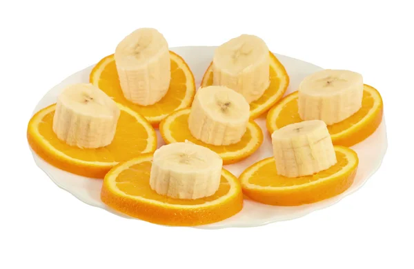 Φέτες πορτοκάλι και η μπανάνα σε ένα πιάτο — Φωτογραφία Αρχείου