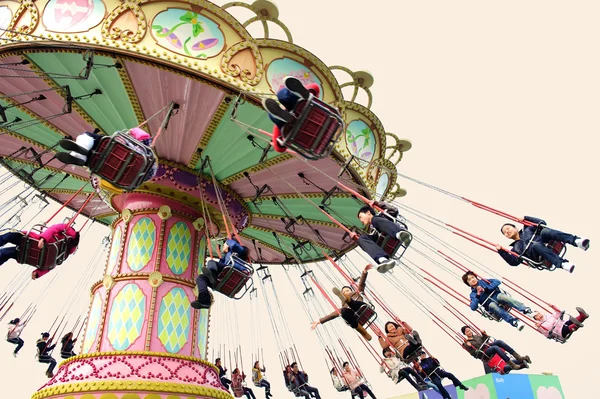 Boldog játék chairoplane — Stock Fotó