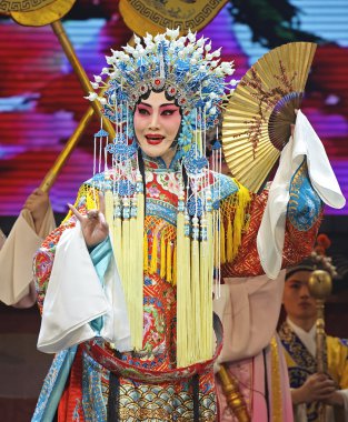 Pretty chinese opera actress with traditional costume clipart
