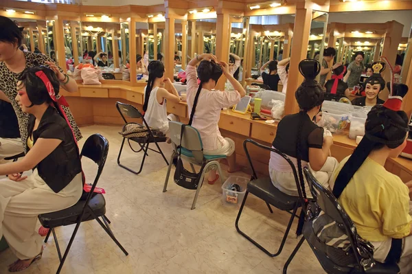 stock image Chinese opera actress painting face backstage