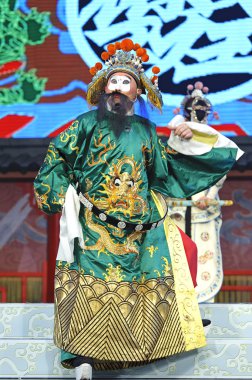 Chinese traditional opera actor with theatrical costume clipart