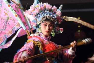 Pretty chinese traditional opera actress with theatrical costume clipart