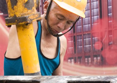 Hardworking laborer on construction site clipart