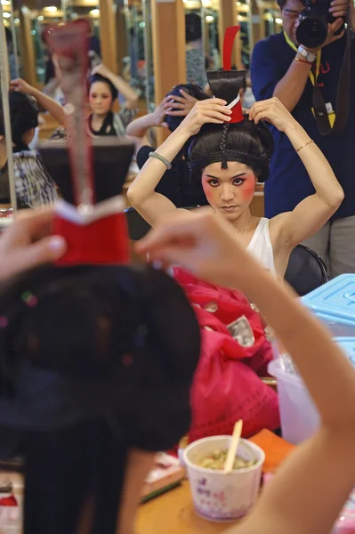 stock image Chinese opera actress painting face at backstage