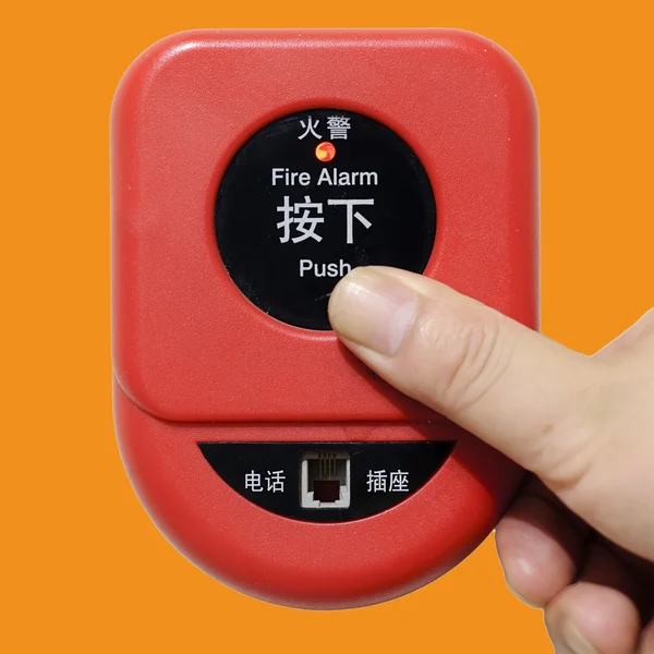 stock image Press fire alarm button with isolated background