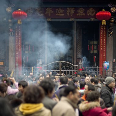 burning incense upon the incense altar in temple clipart