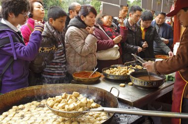 Crowded to buy food in front of the snack bar clipart