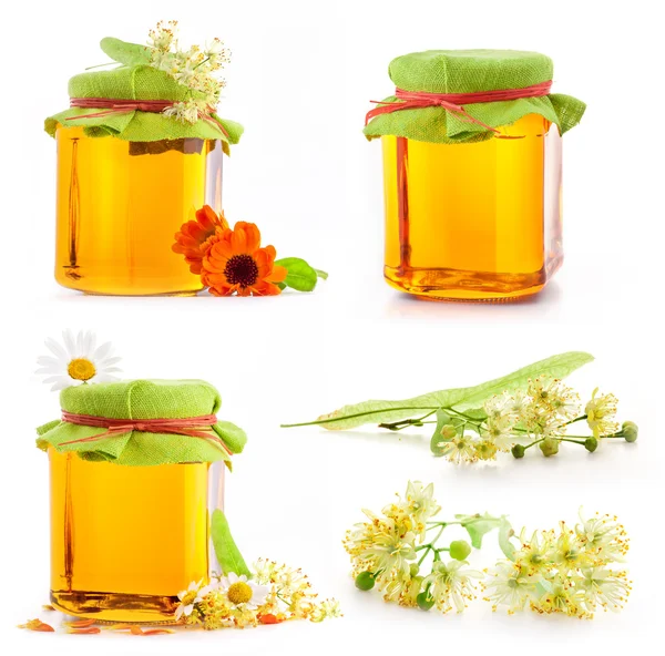 Collection de miel dans un bocal en verre avec des fleurs — Photo