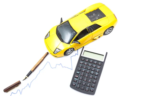Caneta, carro e calculadora — Fotografia de Stock