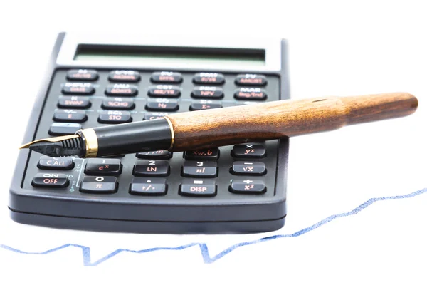 Ручка и калькулятор — стоковое фото
