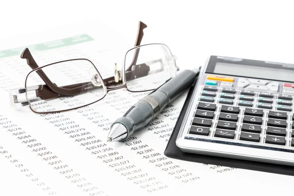 Caneta, calculadora e óculos — Fotografia de Stock