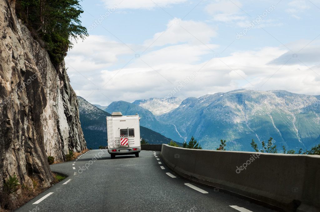 Road with motor home in mountains
