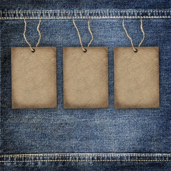 Фон Джинсовая текстура с картонной этикеткой — стоковое фото
