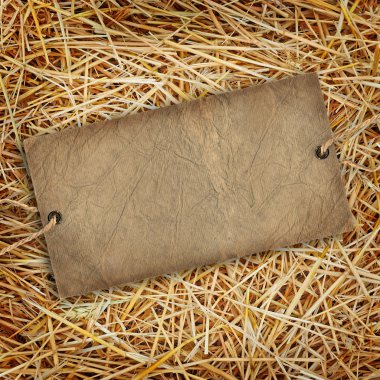 Straw texture background with cardboard label clipart