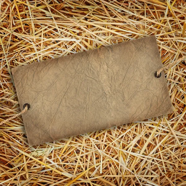 Fundo de textura de palha com etiqueta de papelão — Fotografia de Stock