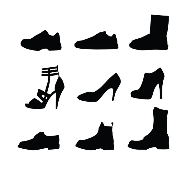 Чоловічі та жіночі силуети взуття — стокове фото