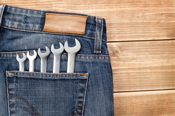 stock image Wrenches in blue jeans pocket