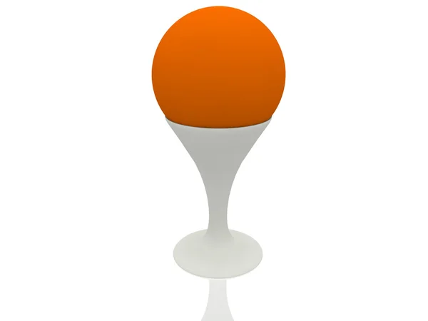 White cup with orange ball — Stock Photo, Image